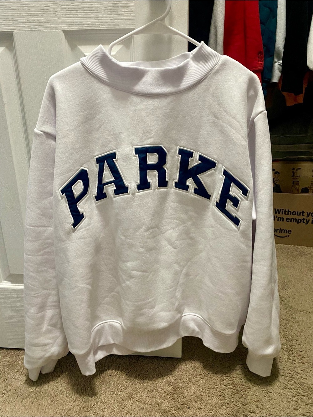 Parker White Pullover Sweatshirt with Navy Appliqué